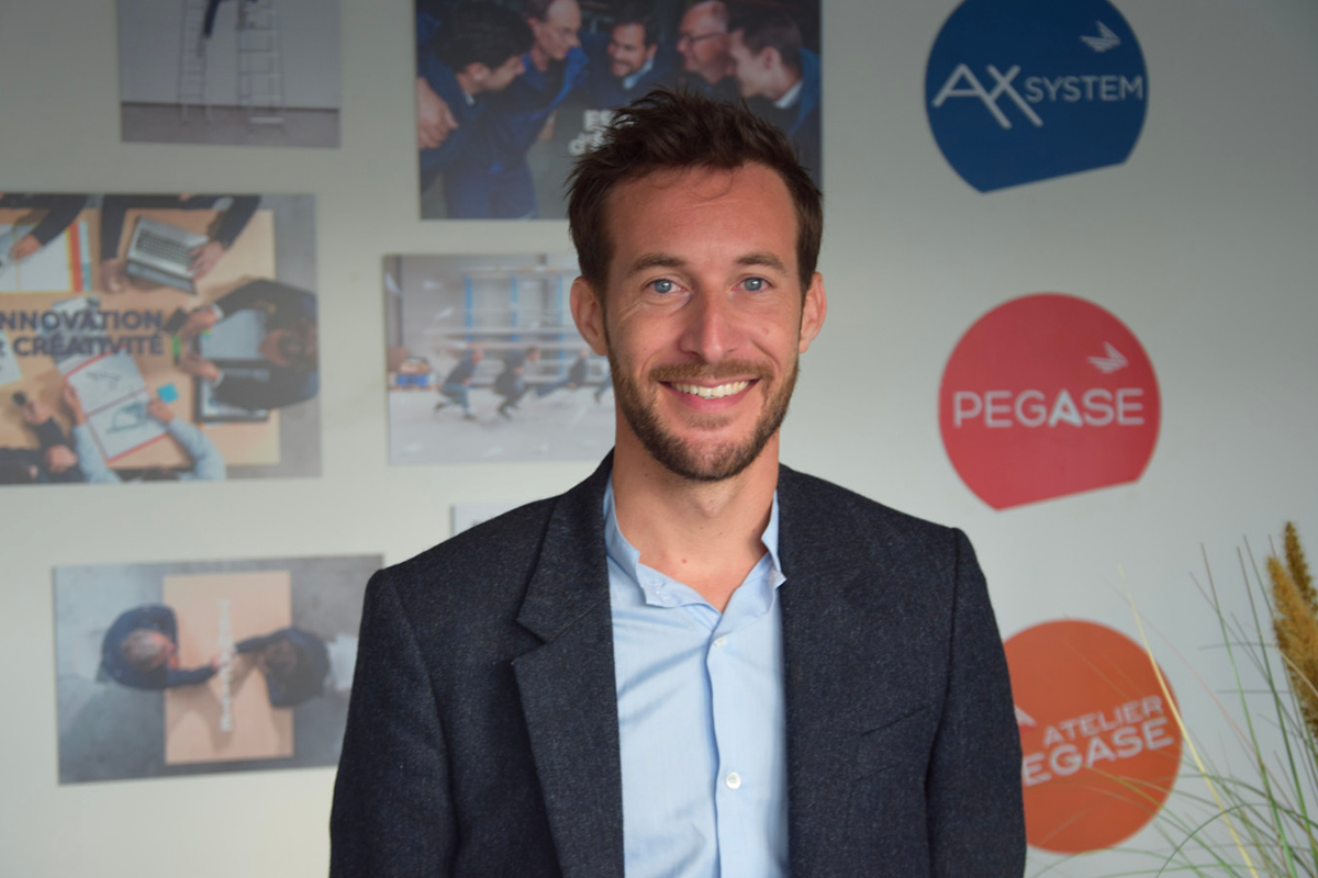 romain-pennel-ax-system AX Group décolle grâce à plusieurs gros contrats|Ax System